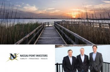 Image of a boardwalk and a sunset beyond Image of a boardwalk and a sunset beyond