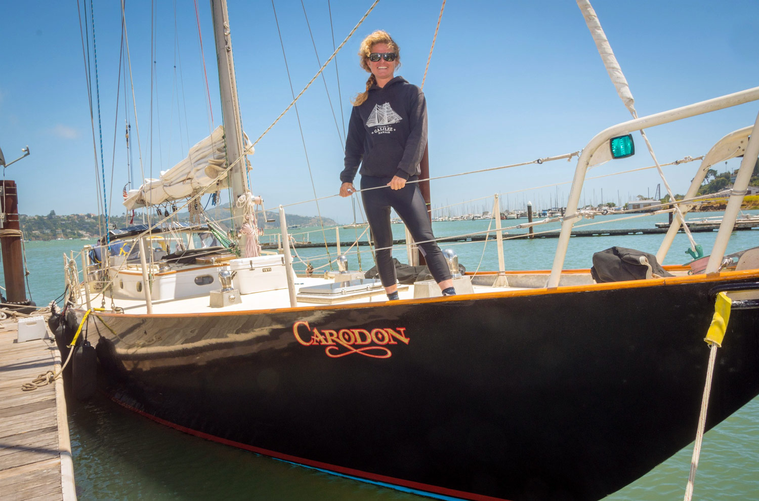 Fine Day For Sailing Image of a Captain Heather on a boat